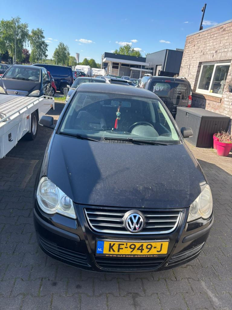 Volkswagen Polo 1.2 47KW 2006 Zwart, Auto's, Voorwielaandrijving, 64 pk, 540 kg, 1198 cc
