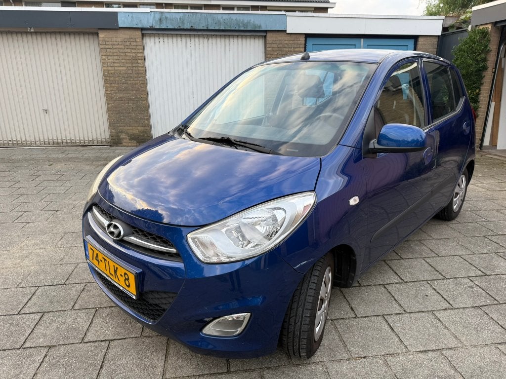 Hyundai i10 1.25 I 5DR 2012 Blauw, Auto's, Voorwielaandrijving, 31 €/maand, 4 cilinders, Blauw