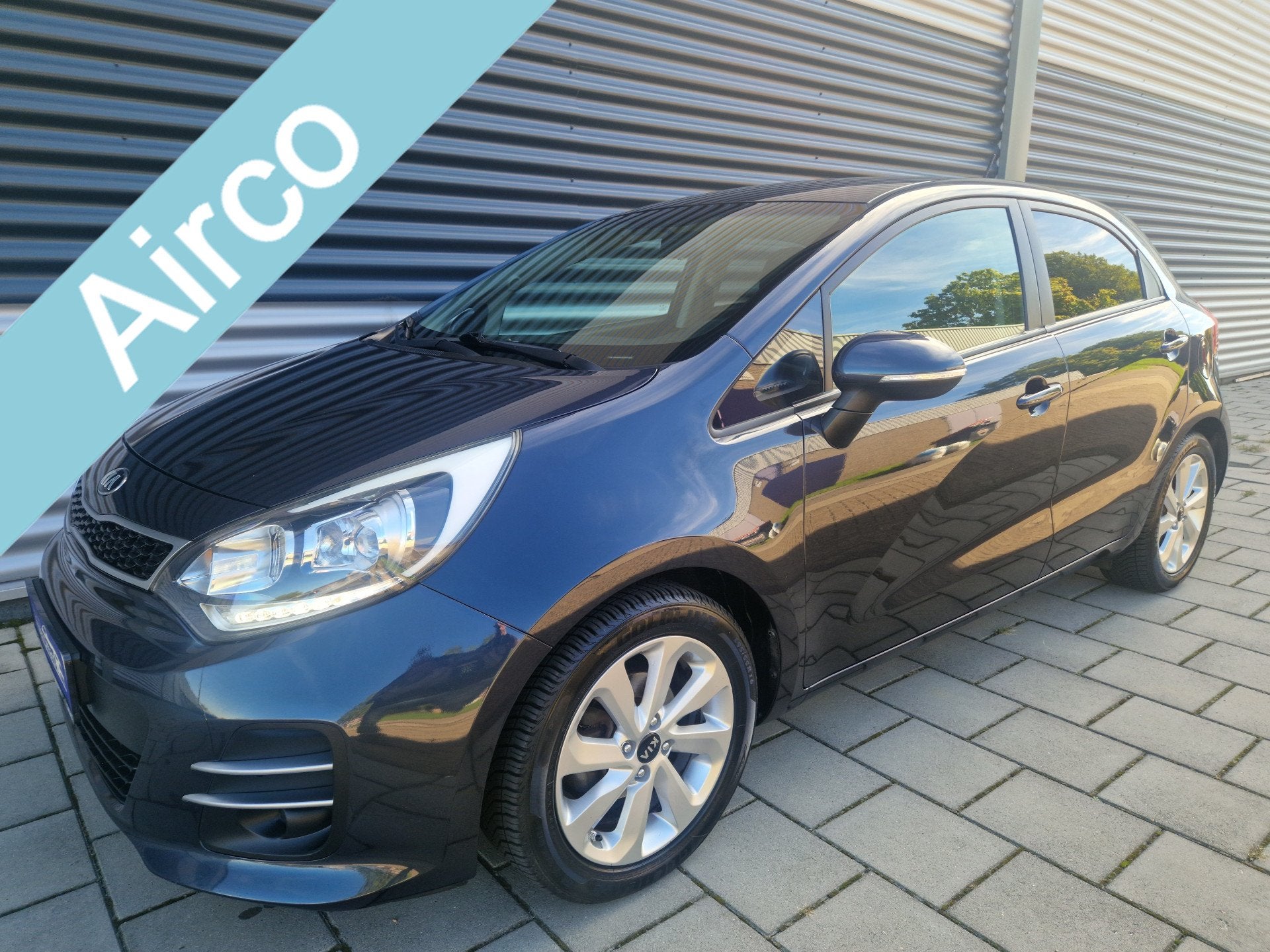 Kia Rio 1.2 CVVT ExecutiveLine (bj 2016), Euro 6, 4 cilinders, Verwarmde buitenspiegels, Blauw