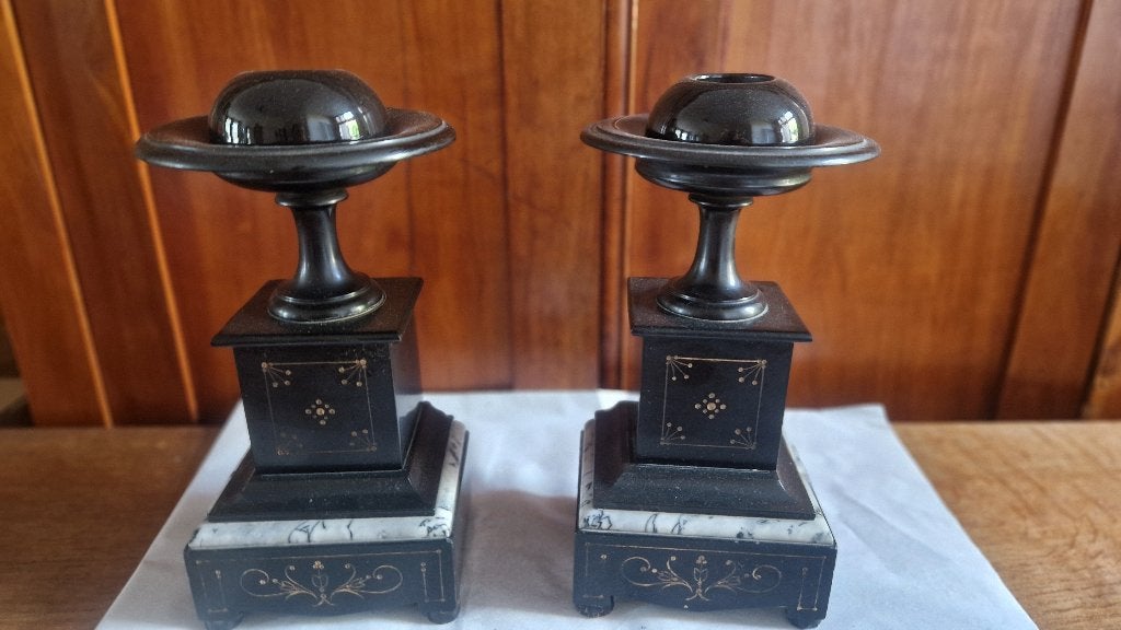 Schouwklok met kandelaars, Ophalen