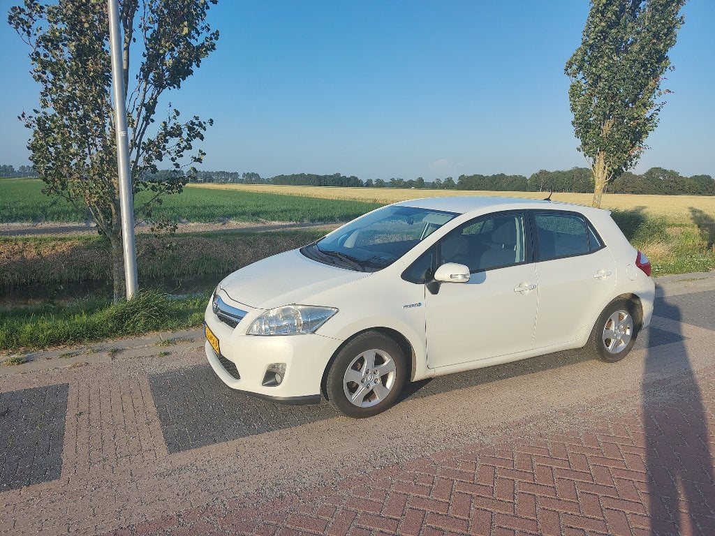 Toyota Auris 1.8 Full Hybrid 5DR CVT 2010 Wit Automaat, Auto's, Toyota, Euro 5, Stof, 4 cilinders, Wit