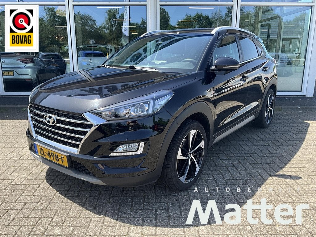 Hyundai Tucson 1.6 T-GDI Comfort Trekhaak, Gebruikt, 4 cilinders, Met garantie (alle), Zwart