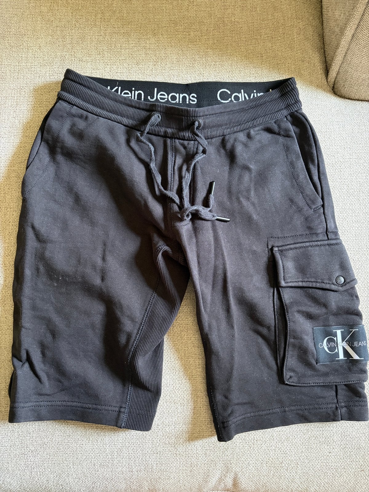 Calvin Klein Jeans broek. Heren. Zwart met een zak. Maat Xs, Verzenden, Zo goed als nieuw, Maat 46 (S) of kleiner, Zwart