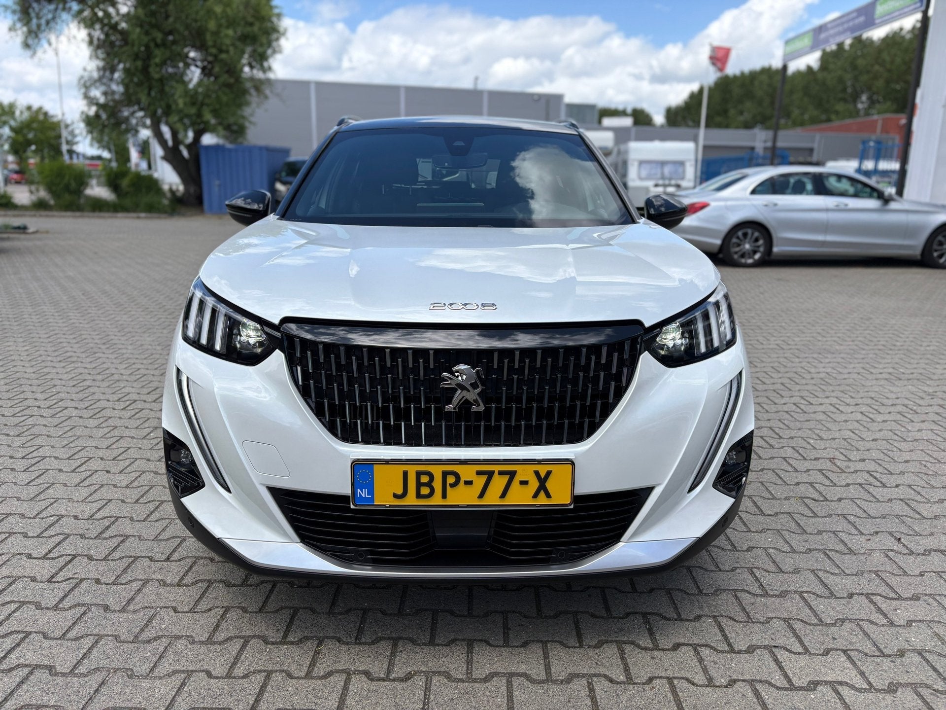 Peugeot 2008 1.2 PureTech GT (BOVAG/RIJKLAARPRIJS), 12 maanden, Gebruikt, Wit, 1180 kg