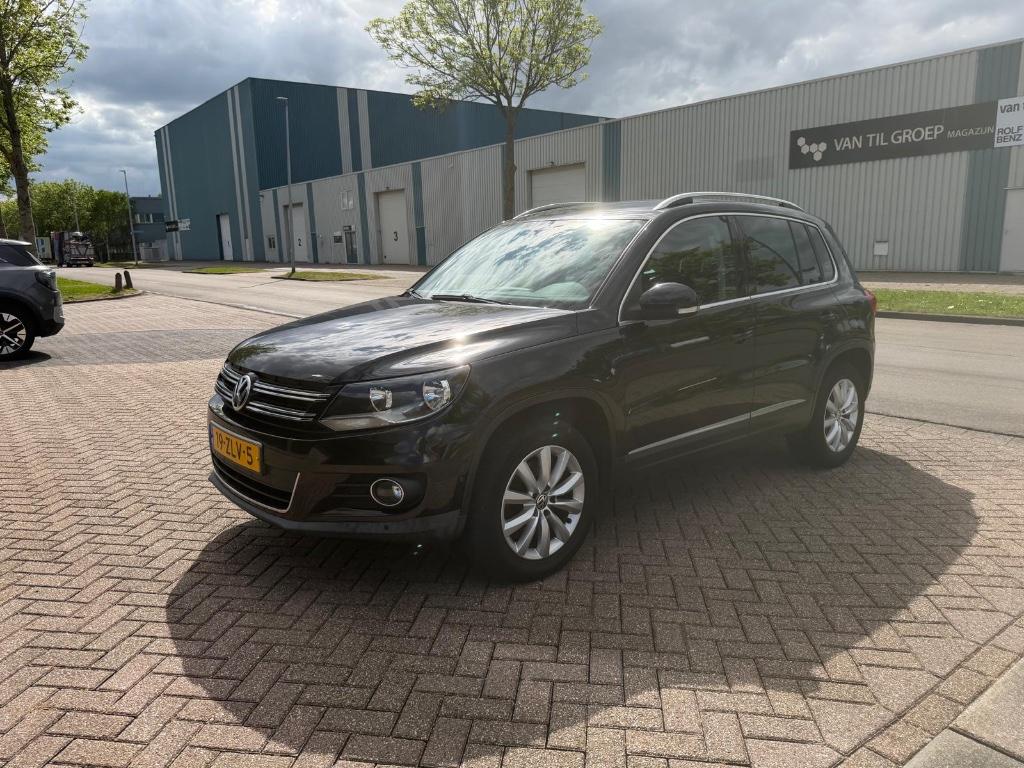 Volkswagen Tiguan 1.4 TSI 118KW BMT 2013 Zwart NL Auto, Auto's, Volkswagen, Voorwielaandrijving, 15 km/l, 4 cilinders, 2000 kg