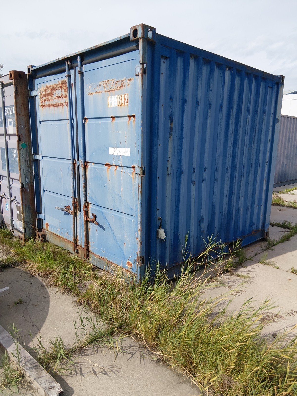 Robuuste 10 ft opslag container met werkbank en elektra, Ophalen