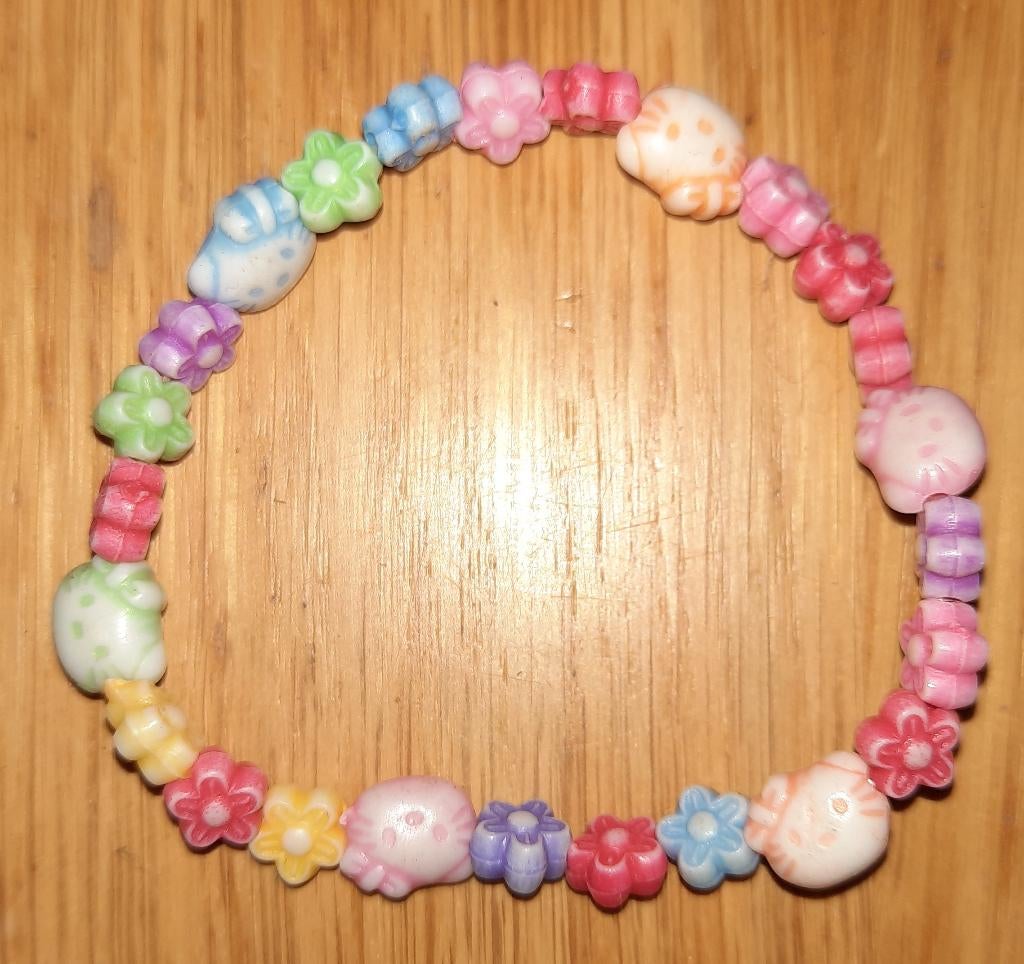 Nieuw Hello Kitty armbandje, Ophalen of Verzenden, Nieuw, Overige kleuren, Elastiek