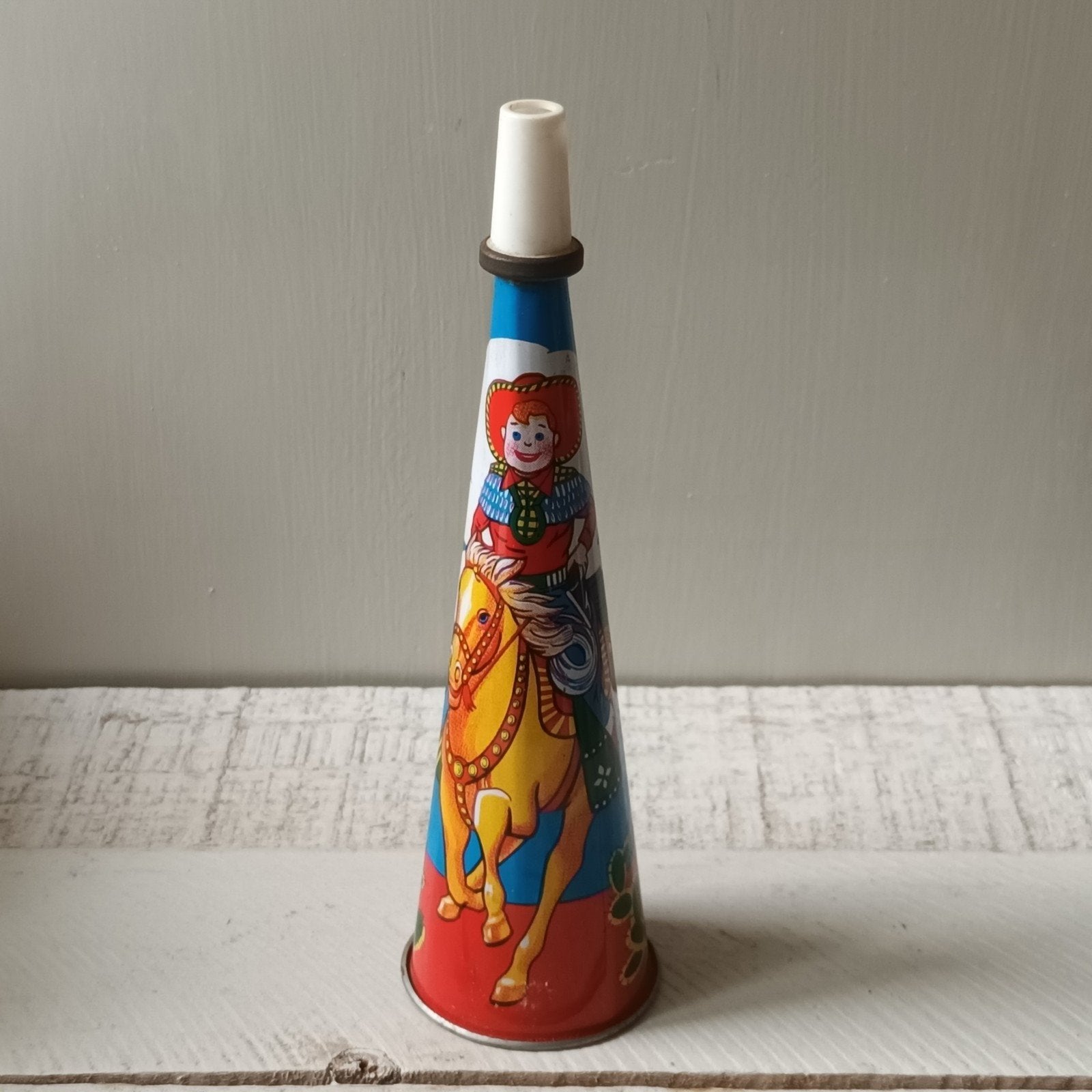 Vintage toeter met cowboy op paard - blikken speelgoed, Antiek en Kunst, Ophalen of Verzenden