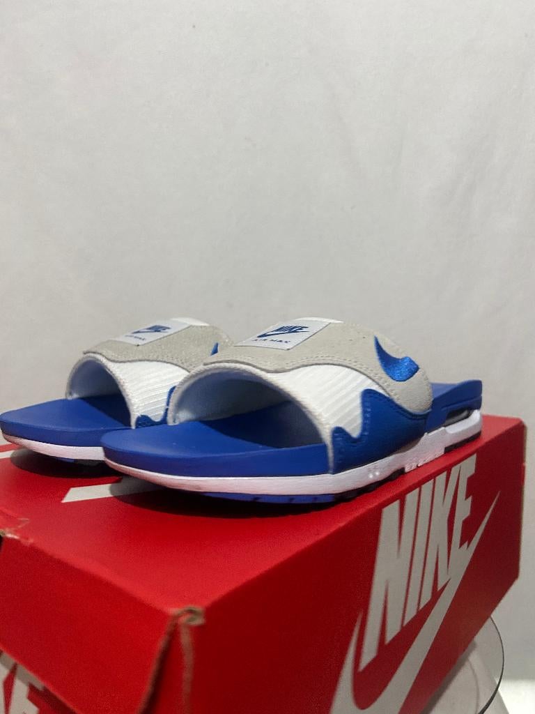 ALS NIEUW! Maat 42,5 - Nike Air Max 1 Slide Royal Blue, Kleding | Heren, Schoenen, Slippers, Nike, Zo goed als nieuw, Nike
