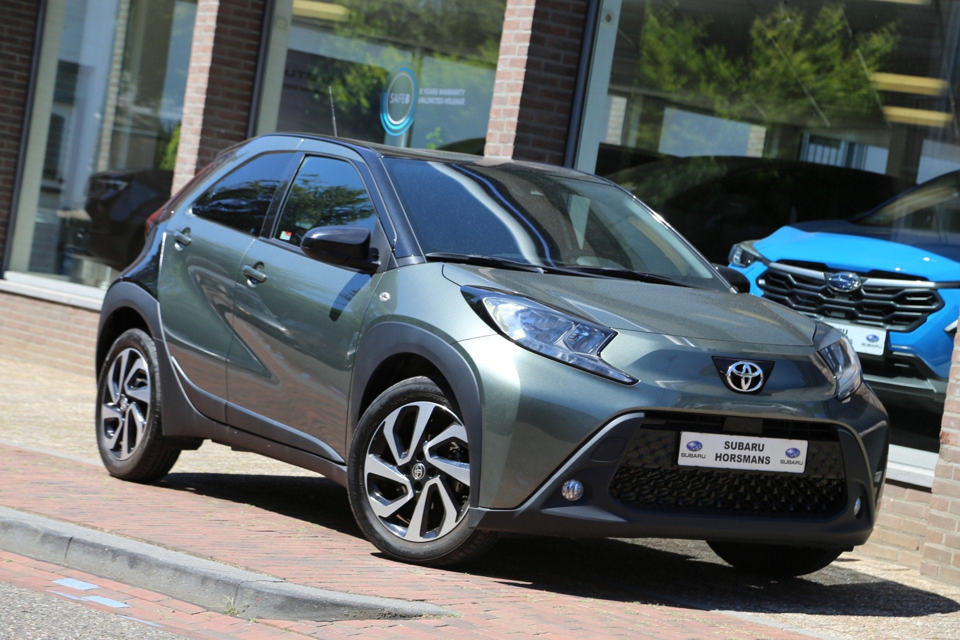 Toyota Aygo X 1.0 VVT-i MT Pulse Navi Carplay ACC Camera, Auto's, 12 maanden, Stof, Gebruikt, 4 stoelen