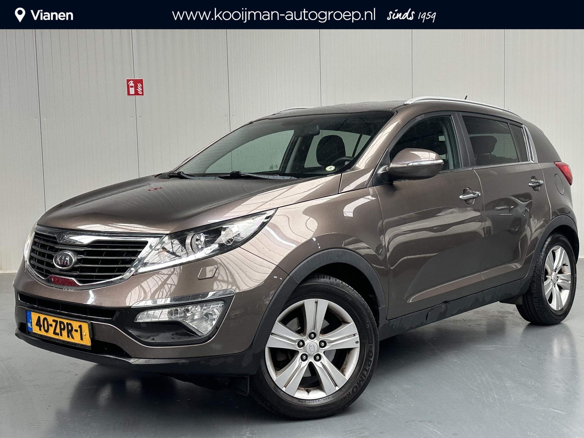 Kia Sportage 2.0 X-clusive AUTOMAAT Nette auto, goed onderho, 4 cilinders, Bruin, 163 pk, 1600 kg