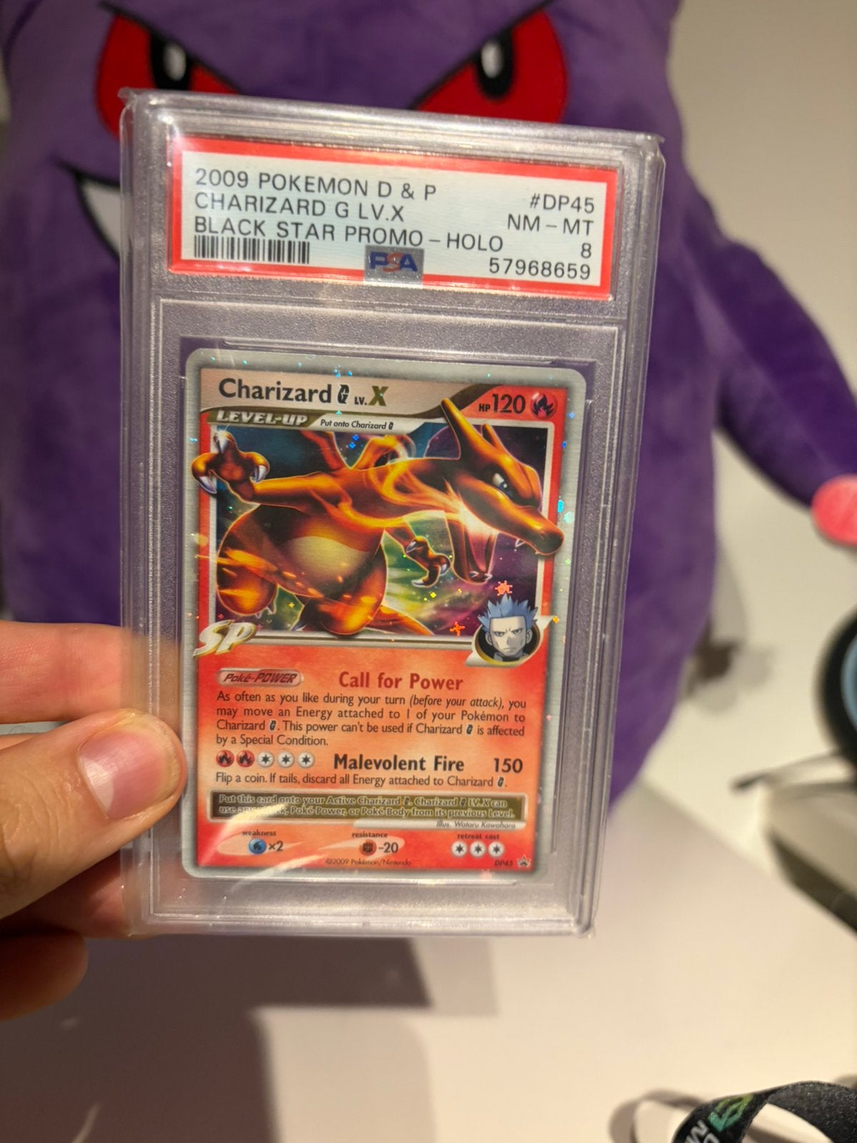 Charizard G LV.X PSA 8 Black Star Promo Holo, Ophalen of Verzenden, Zo goed als nieuw