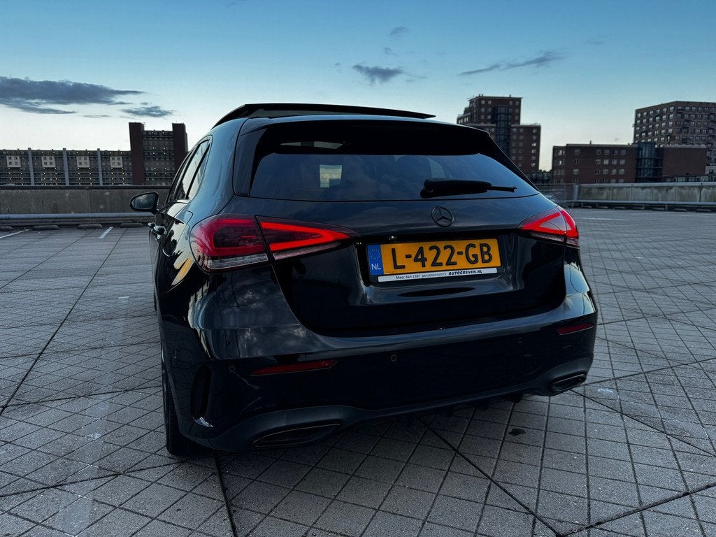 Mercedes-Benz A-klasse 180 AMG Premium Plus PANO LEER FULL, Auto's, 136 pk, Gebruikt, 4 cilinders, Automatische klimaatregeling