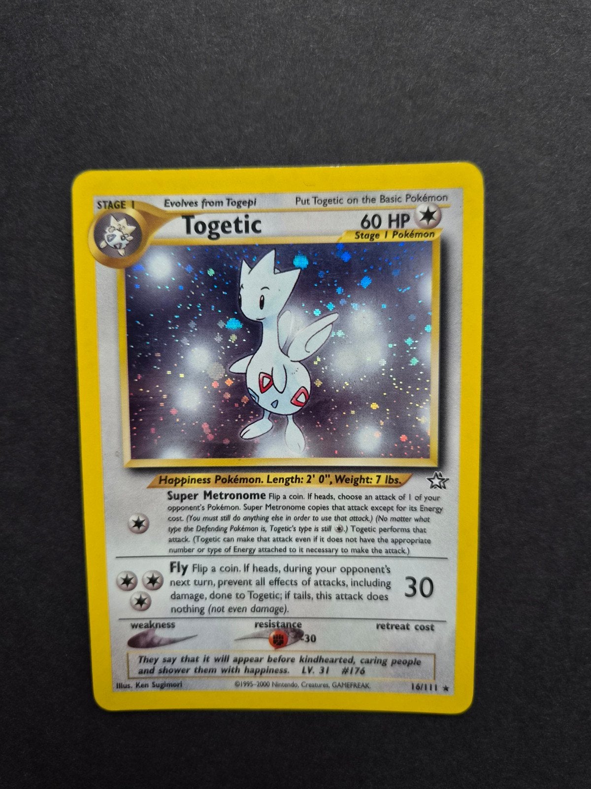 Togetic 16/111 Pokemon Neo Genesis holo, Ophalen of Verzenden, Zo goed als nieuw, Booster, Foil