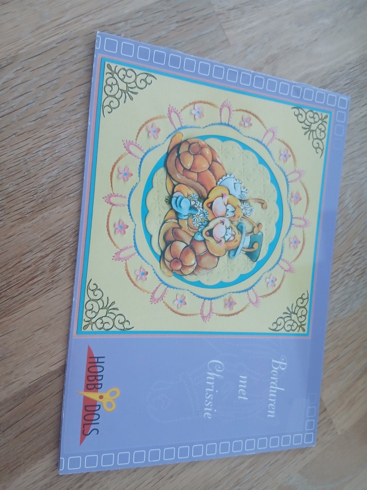 Borduren met Chrissie - Borduurpatronen Hobbydols, Ophalen of Verzenden, Zo goed als nieuw