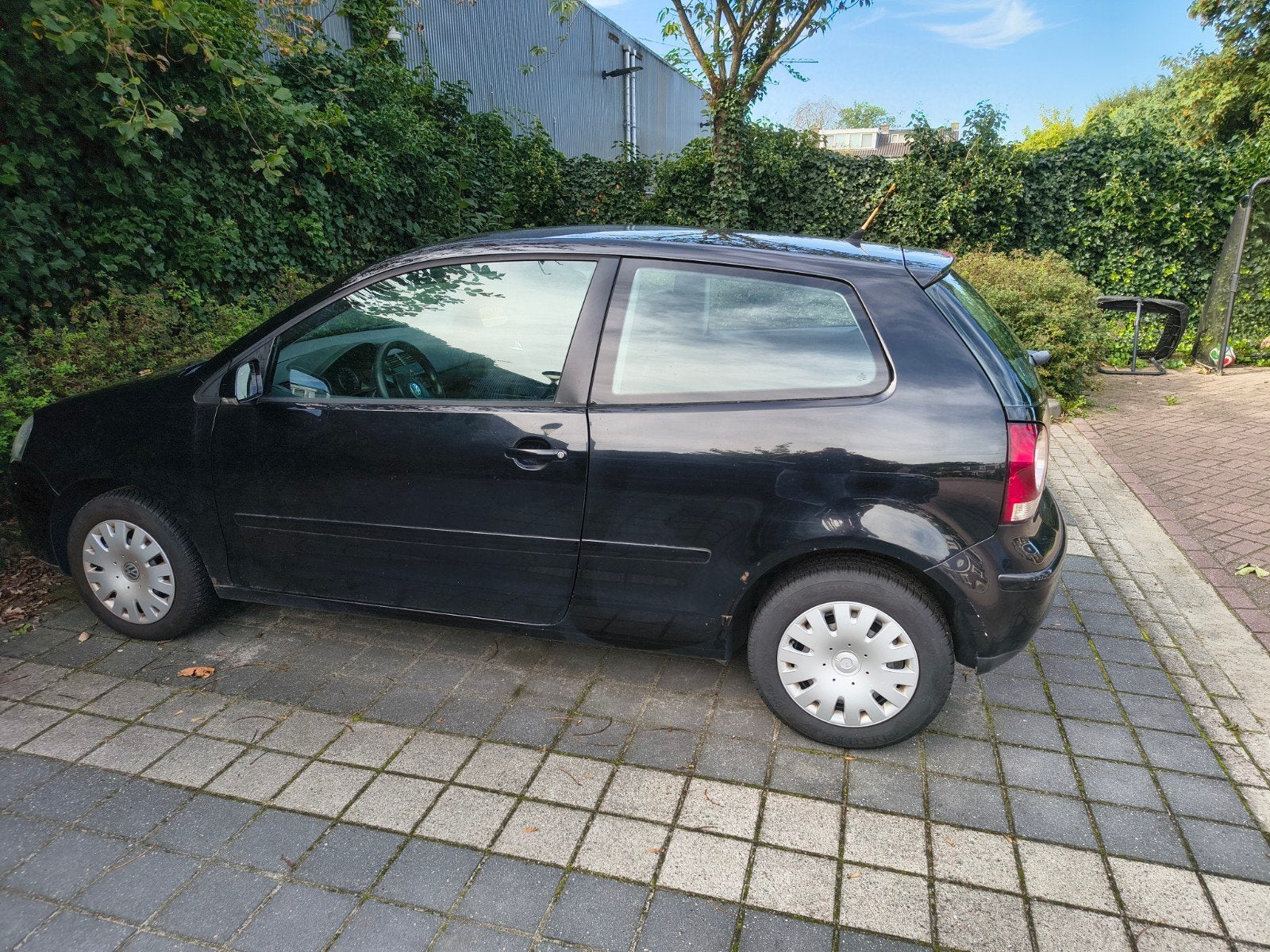 Volkswagen Polo 1.4 55KW 2006 Zwart, Auto's, Voorwielaandrijving, 15 km/l, 74 pk, Zwart