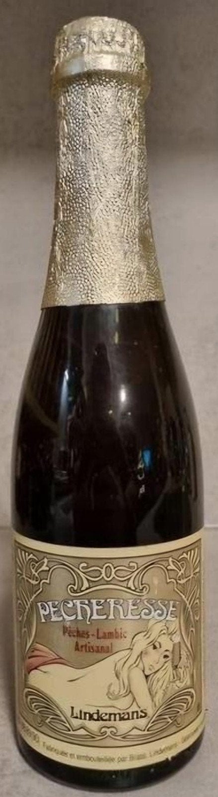 Lindemans Pêcheresse, perzik Lambik - '87-'90, Verzamelen, Ophalen of Verzenden, Zo goed als nieuw, Flesje(s), Overige merken