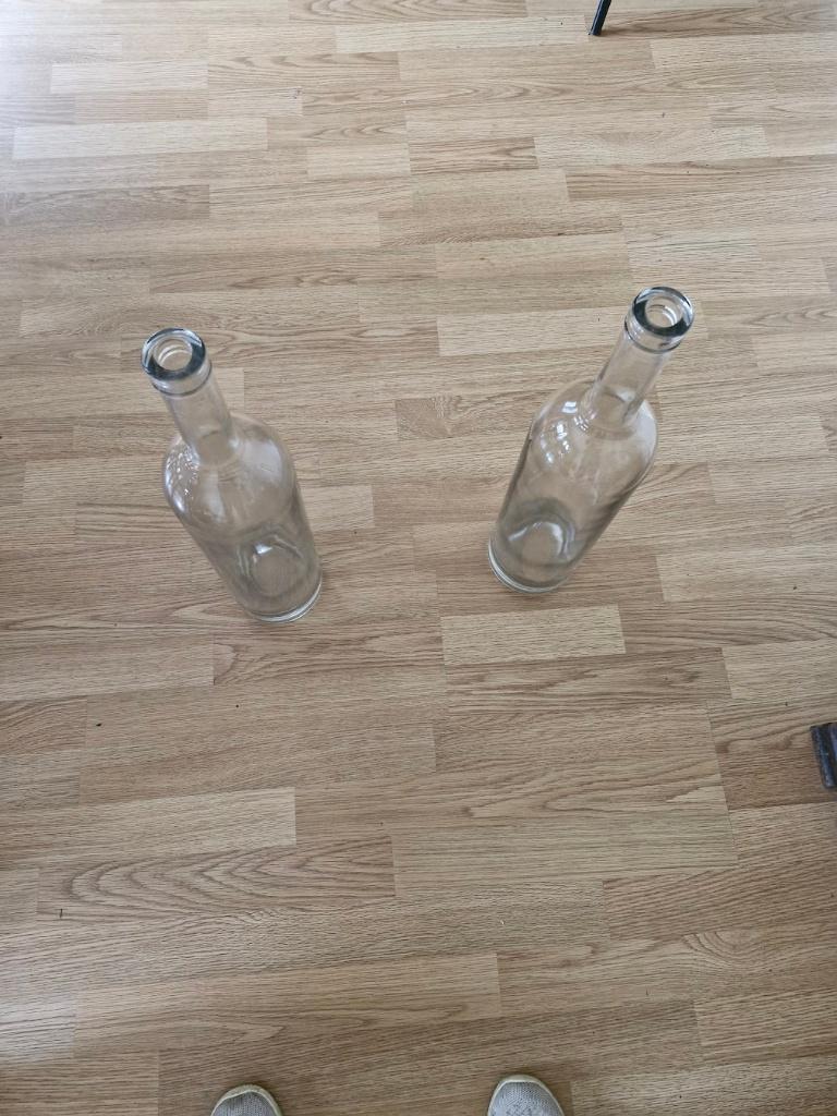 2 grote lange flessen, Overige kleuren, Ophalen of Verzenden, 75 cm of meer, Glas