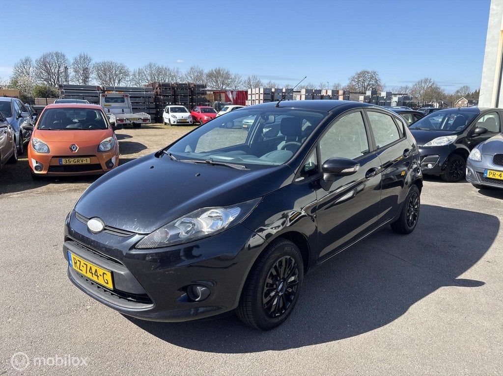 Ford Fiesta 1.25 Ghia Nieuwe Apk Weinig kms, Auto's, Voorwielaandrijving, Euro 5, 1242 cc, Electronic Stability Program (ESP)