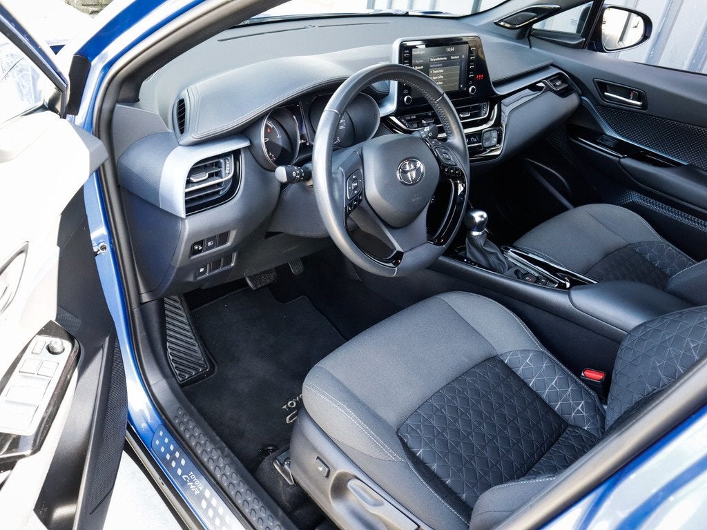 Toyota C-HR 1.8 Hybrid Business Plus 1e-Eig. & Dealer-Onderh, Auto's, Toyota, 12 maanden, Stof, 4 cilinders, Blauw