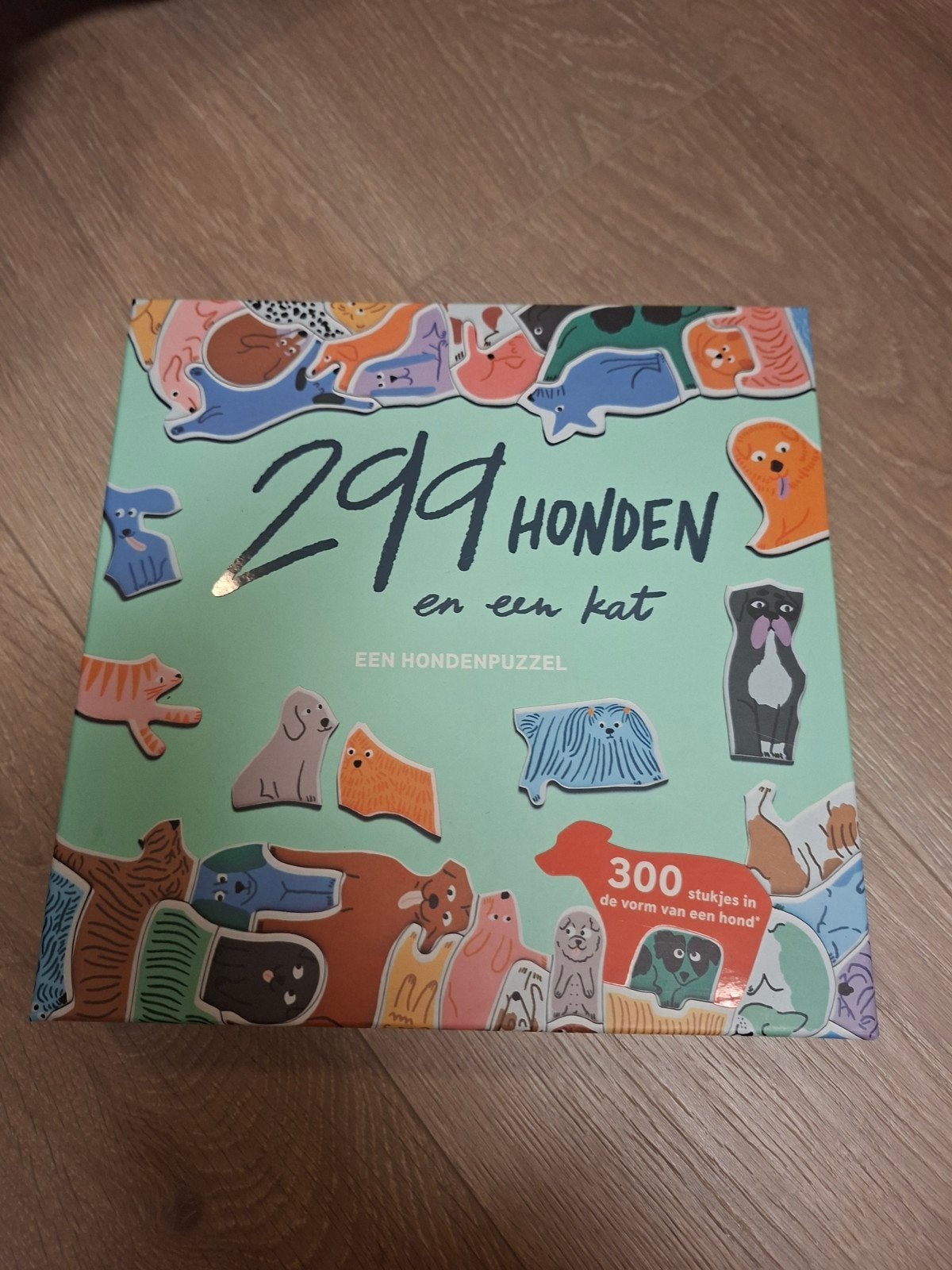 299 Honden en een Kat - Een Hondenpuzzel, Een of twee spelers, Ophalen of Verzenden, Nieuw, Laurence King Publishing