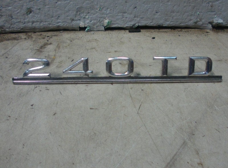 Embleem Mercedes-Benz T/TE/TD (S123) 1982 1238171515, Auto-onderdelen, Gebruikt, Mercedes-Benz AG, Mercedes-Benz, Mercedesstraße 120, Stuttgart 70372, , Duitsland