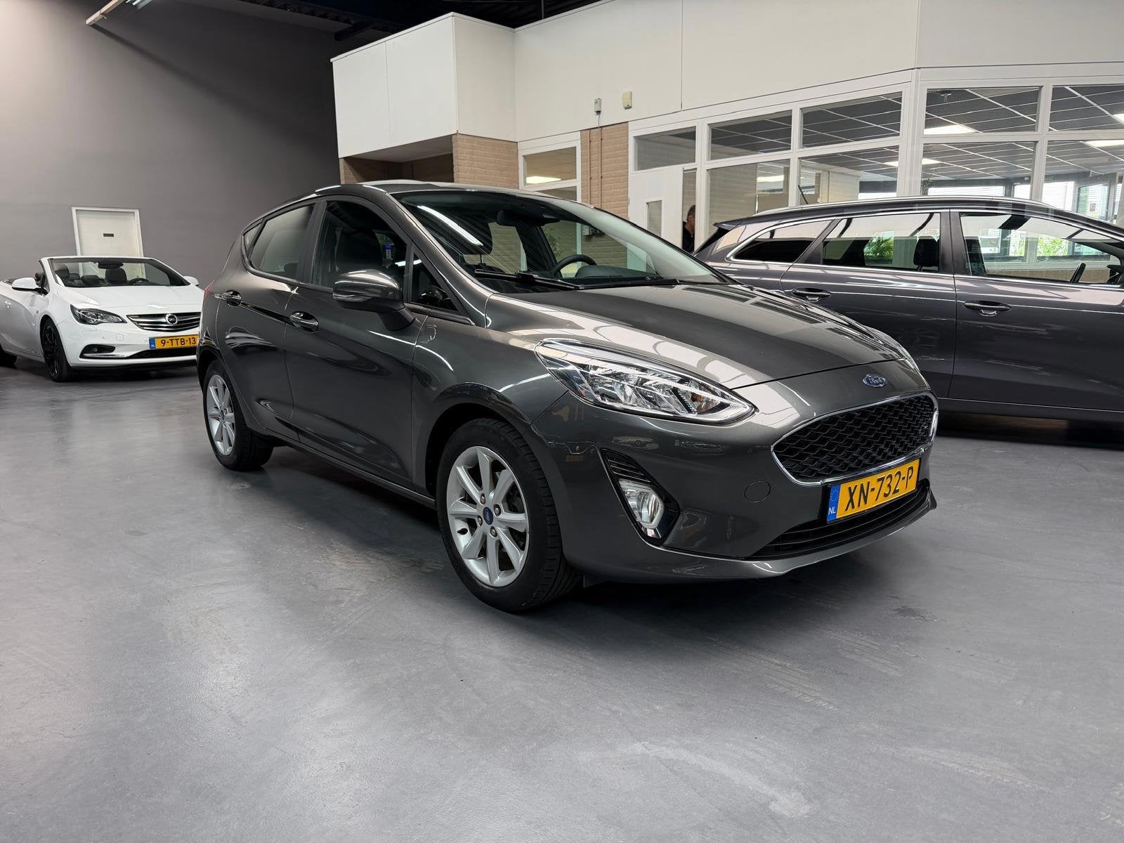 Ford Fiesta 1.1 Trend CARPLAY NAVI PARKEERSENSOREN NAP NL AU, Voorwielaandrijving, Gebruikt, Lichtsensor, Origineel Nederlands