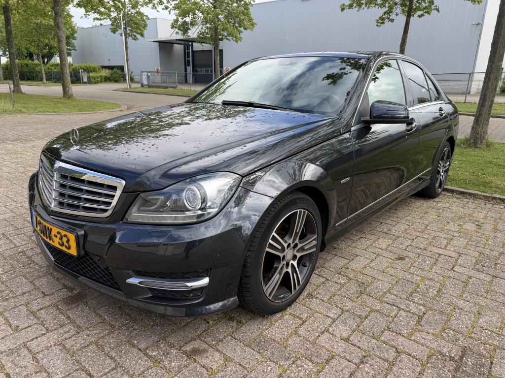 Mercedes-Benz C-Klasse 180 Amb. Avantgarde (bj 2013), 4 cilinders, 157 pk, Leder en Stof, Zwart