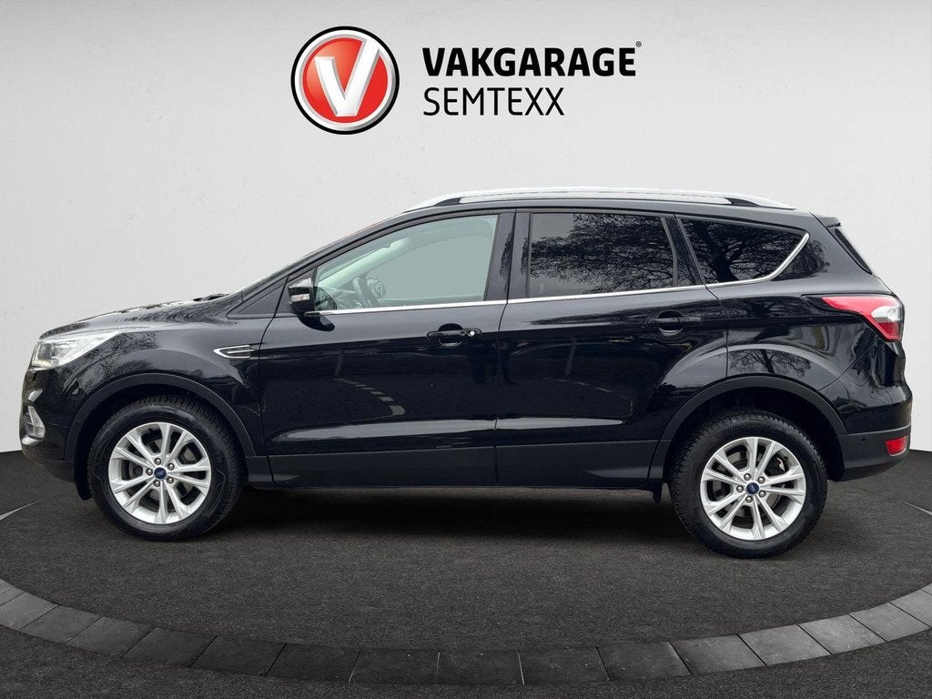 Ford Kuga 1.5 EcoBoost Titanium| Clima | Cruise | Navi | Key, Auto's, Ford, Voorwielaandrijving, 4 cilinders, Leder en Stof, Zwart
