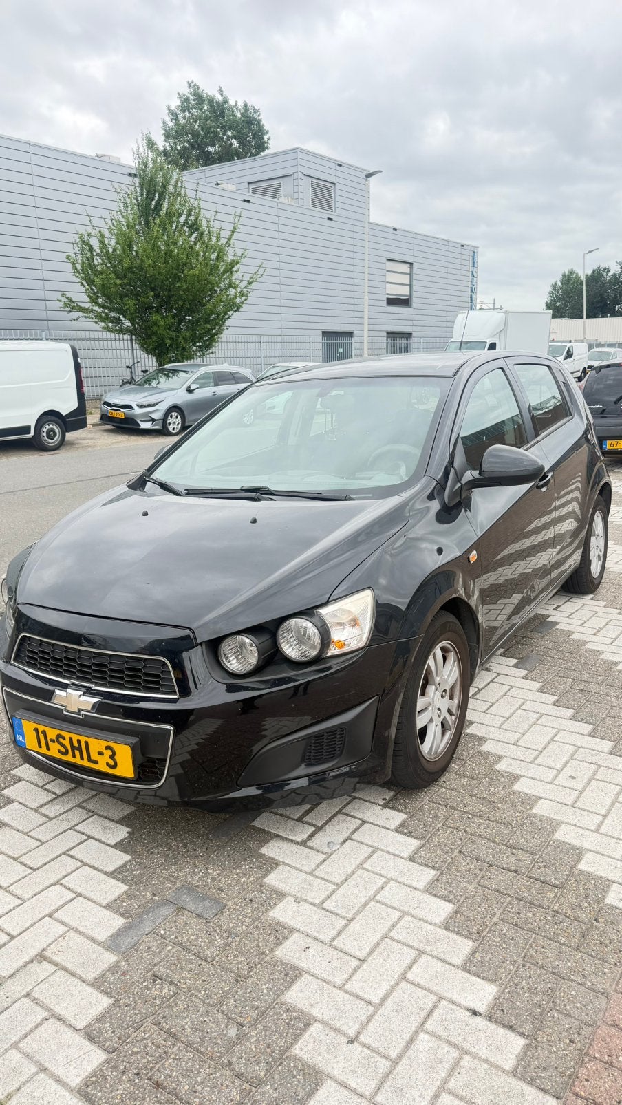 Chevrolet Aveo 1.4 5D 2011 Zwart, Auto's, Chevrolet, Particulier, Aveo, Airconditioning, Bluetooth, Boordcomputer, Centrale vergrendeling