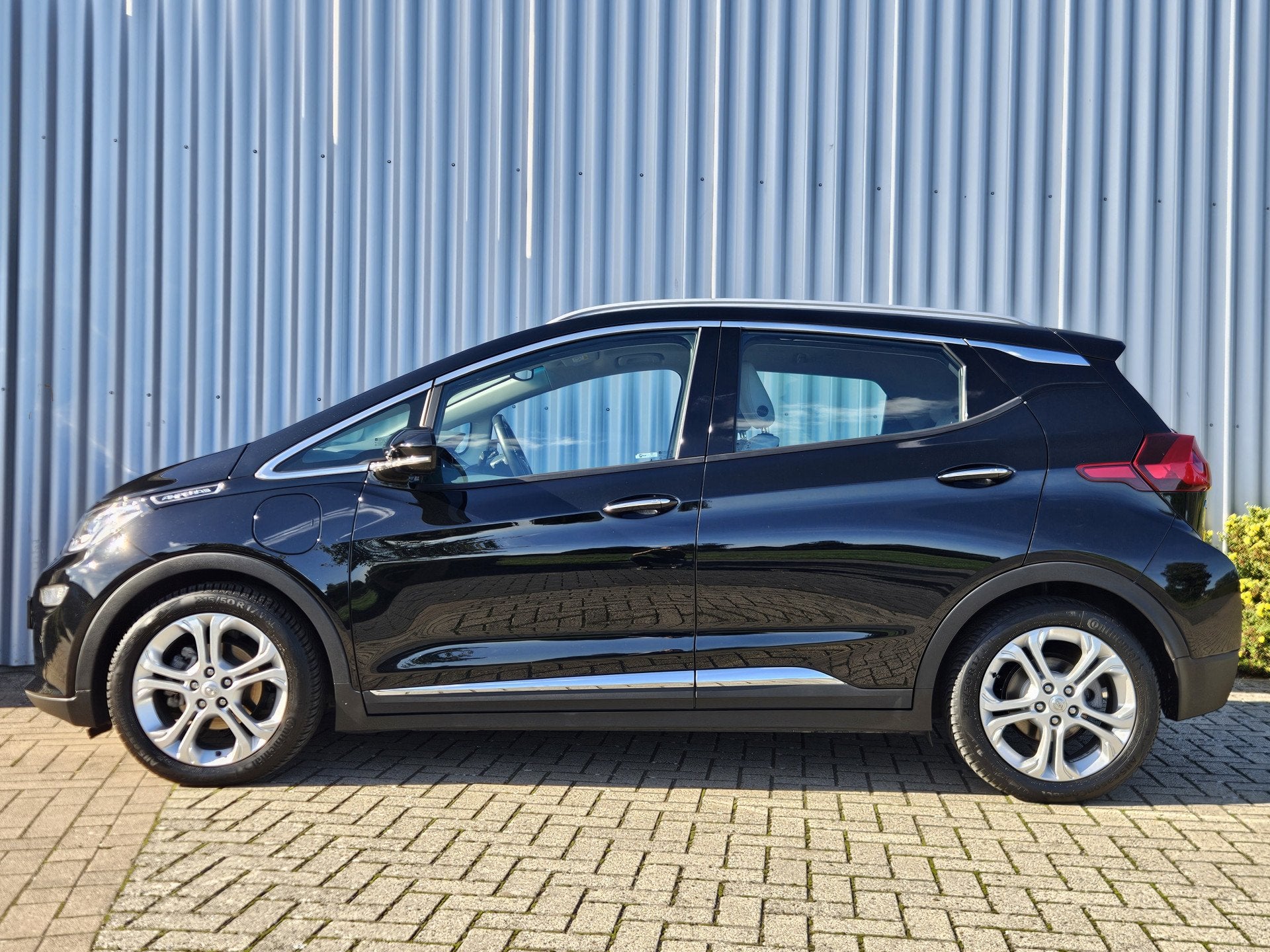 Opel Ampera-E Business Executive 60 kWh / Nieuw Accupakket!, Auto's, Opel, Stof, Gebruikt, Zwart, Origineel Nederlands