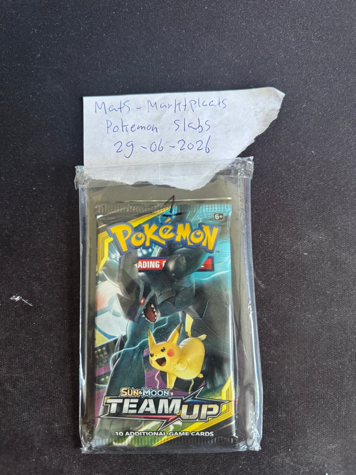 Pokemon Team Up Booster - Single Pack Blister Pikachu, Ophalen of Verzenden, Zo goed als nieuw, Booster, Foil