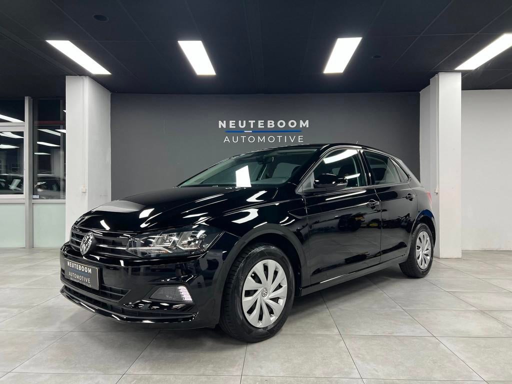 Volkswagen Polo 1.0 TSI Comfortline | Navigatie | Carplay, Voorwielaandrijving, Stof, Gebruikt, Zwart