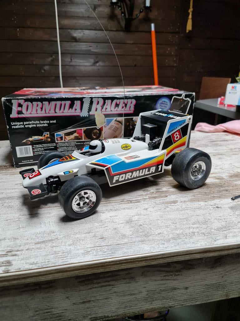 Vintage Bestuurbare F1 Auto - Nieuwstaat in Doos!, Overige merken, Auto, Groter dan 1:32, Ophalen of Verzenden