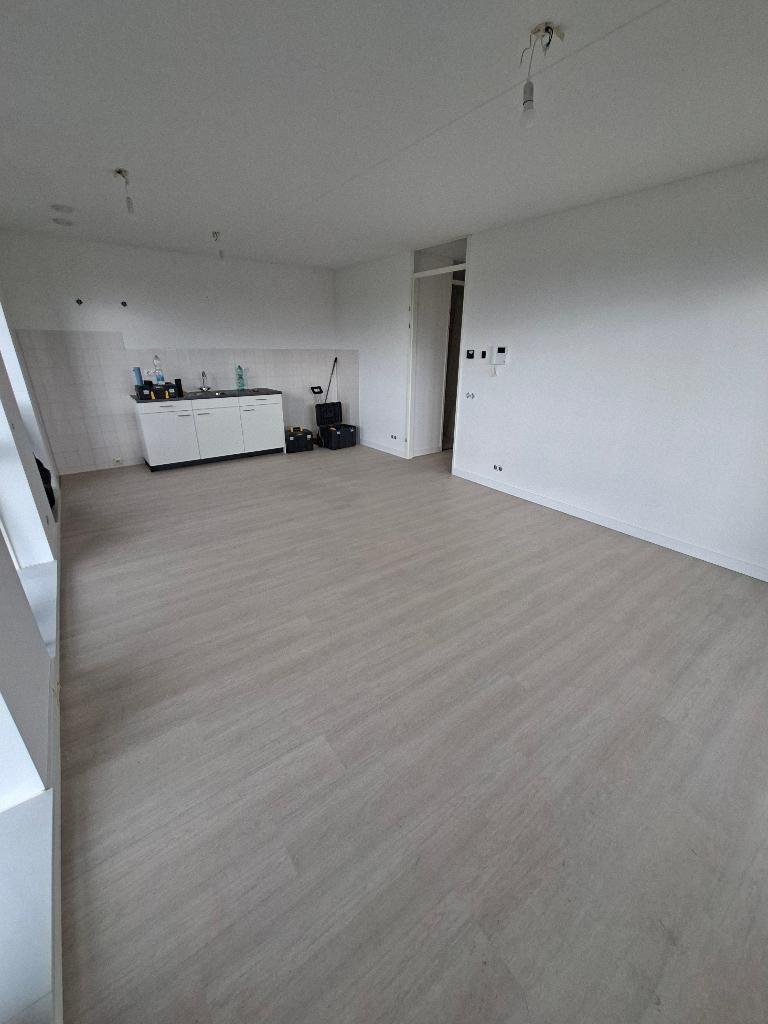 plak pvc, vinyl laminaat legger
