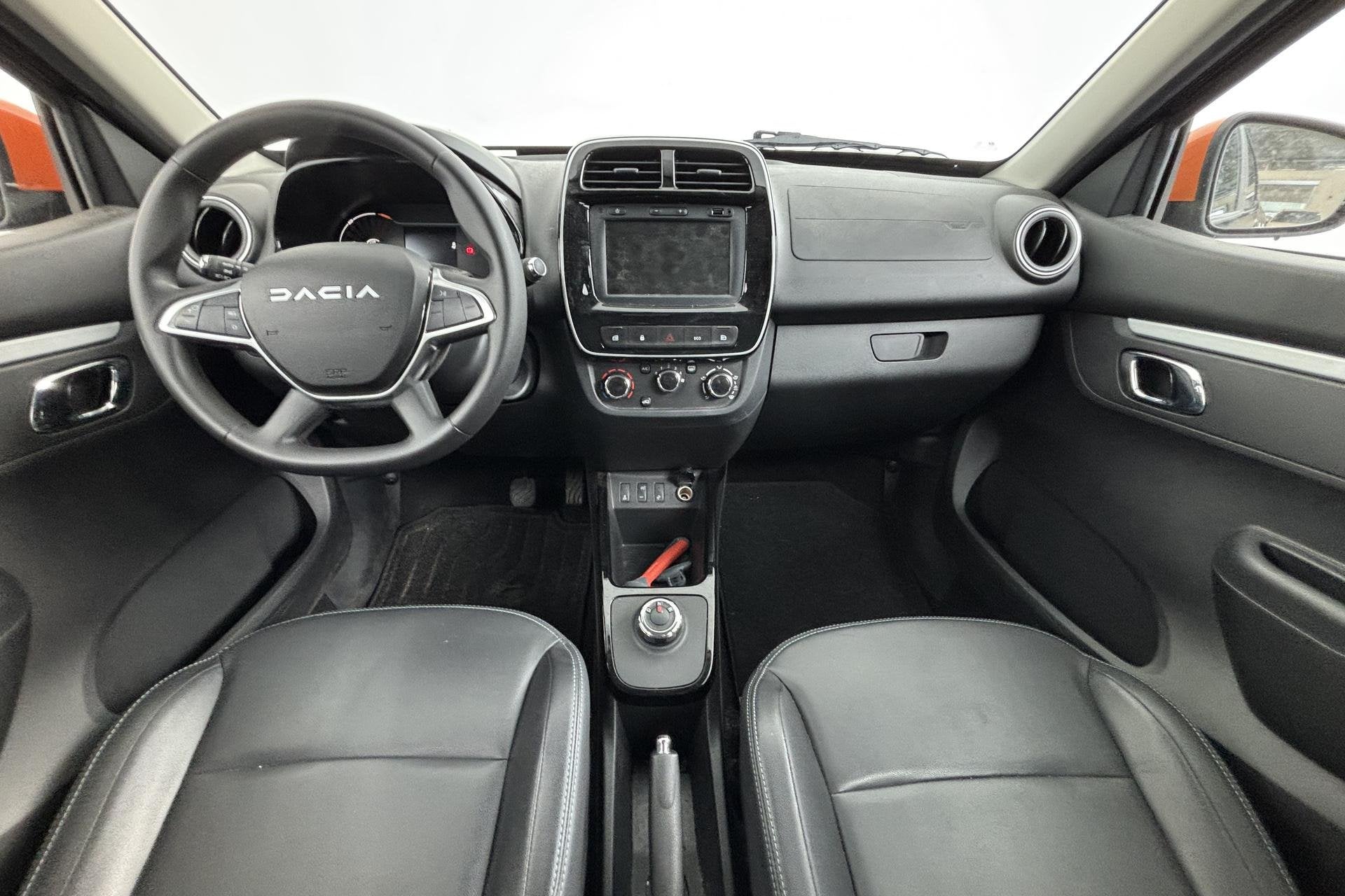 Dacia Spring Expression 27 kWh Compact, zuinig en verrassend, Auto's, Gebruikt, Zwart, Parkeersensor, Te koop