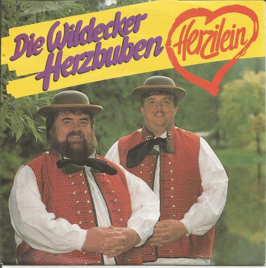 VERKOCHT Die Wildecker Herzbuben – Herzilein (1990), Fotohoes, 7 inch, Ophalen of Verzenden, Zo goed als nieuw