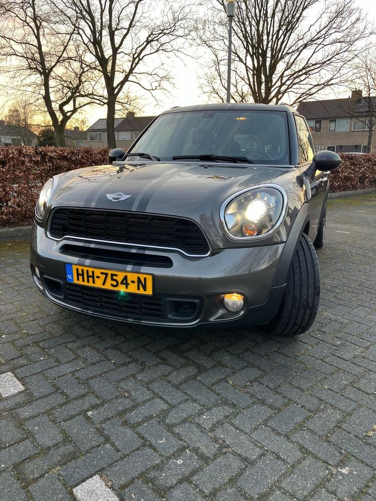 Mini Countryman 1.6 Cooper S AUT 2012 Grijs 184PK, Auto's, Mini, Automaat, 4 stoelen, Bruin, Vierwielaandrijving