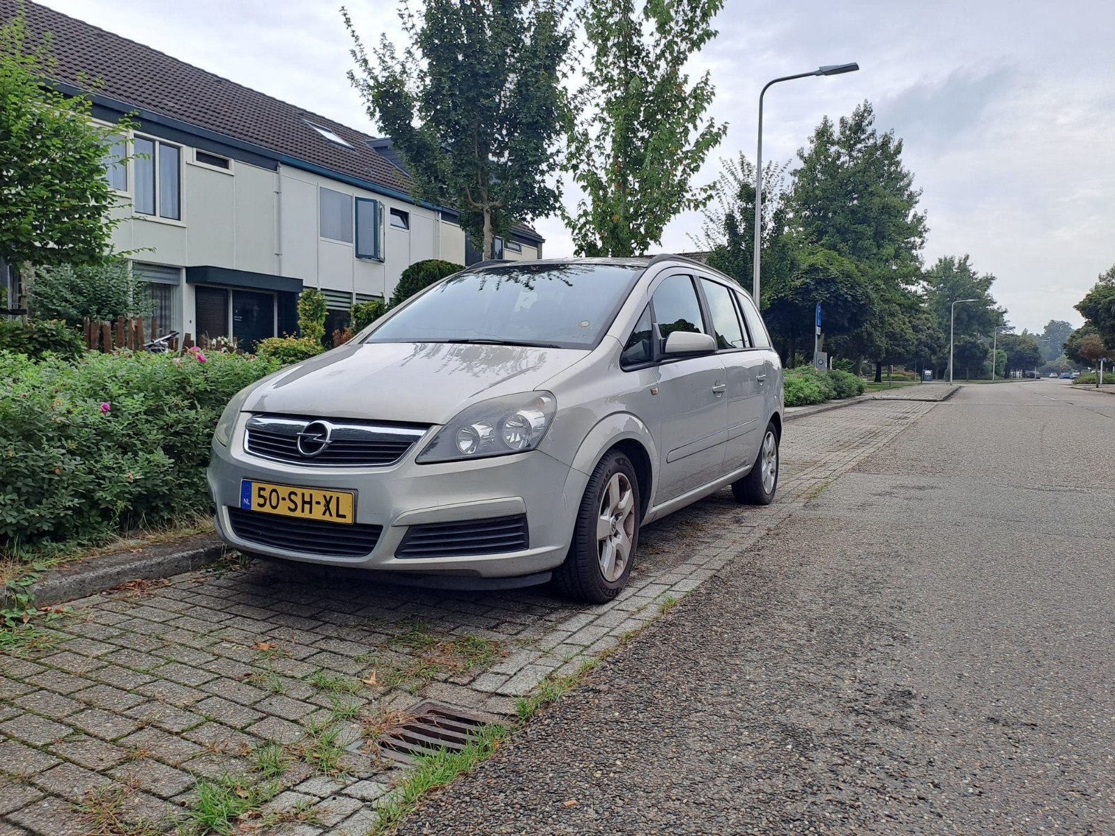 Opel Zafira 1.8 2006 grijs 7p. rijdt goed, Auto's, 4 cilinders, Origineel Nederlands, Grijs, Particulier