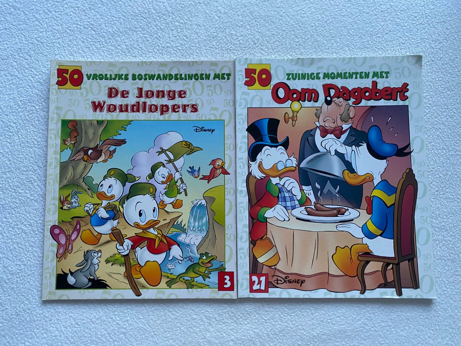 Donald Duck - 2 stuks, Boeken, Meerdere stripboeken, Ophalen of Verzenden, Zo goed als nieuw