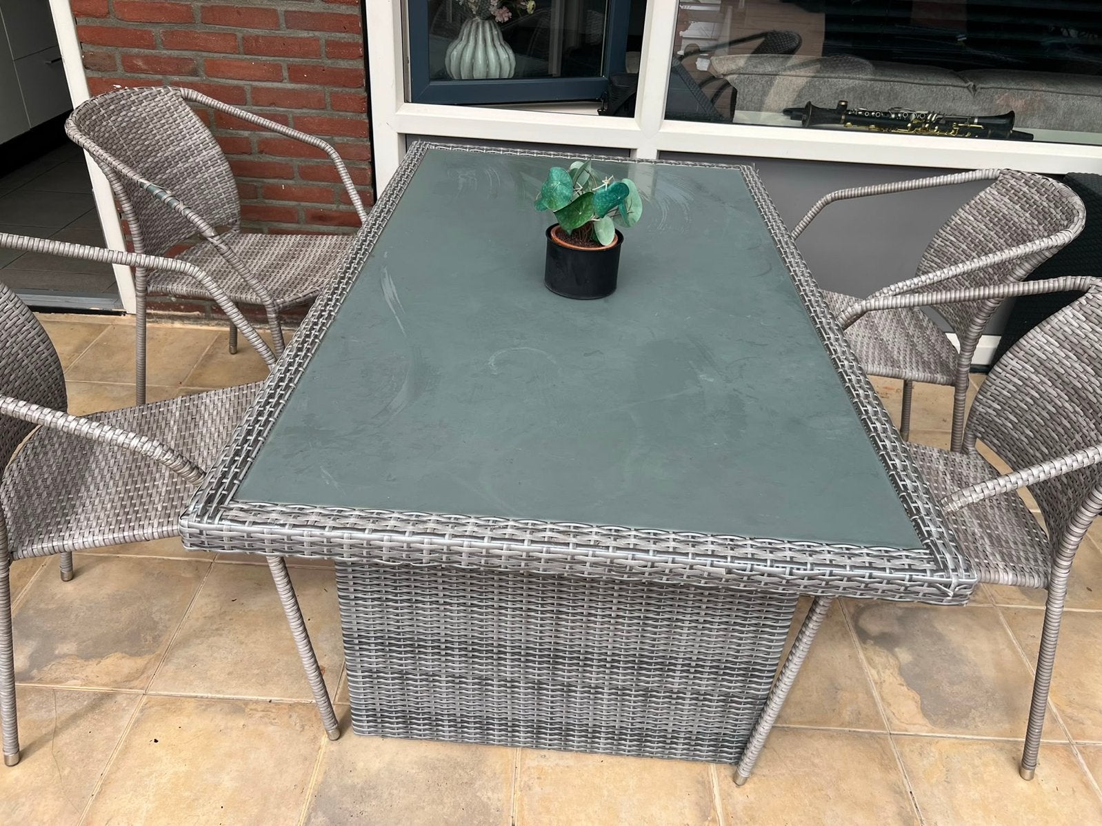 Wicker tuinset met glazen tafel en 4 stoelen, Tuin en Terras, Tuinsets en Loungesets, Ophalen, 4 zitplaatsen, Gebruikt, Eettafel