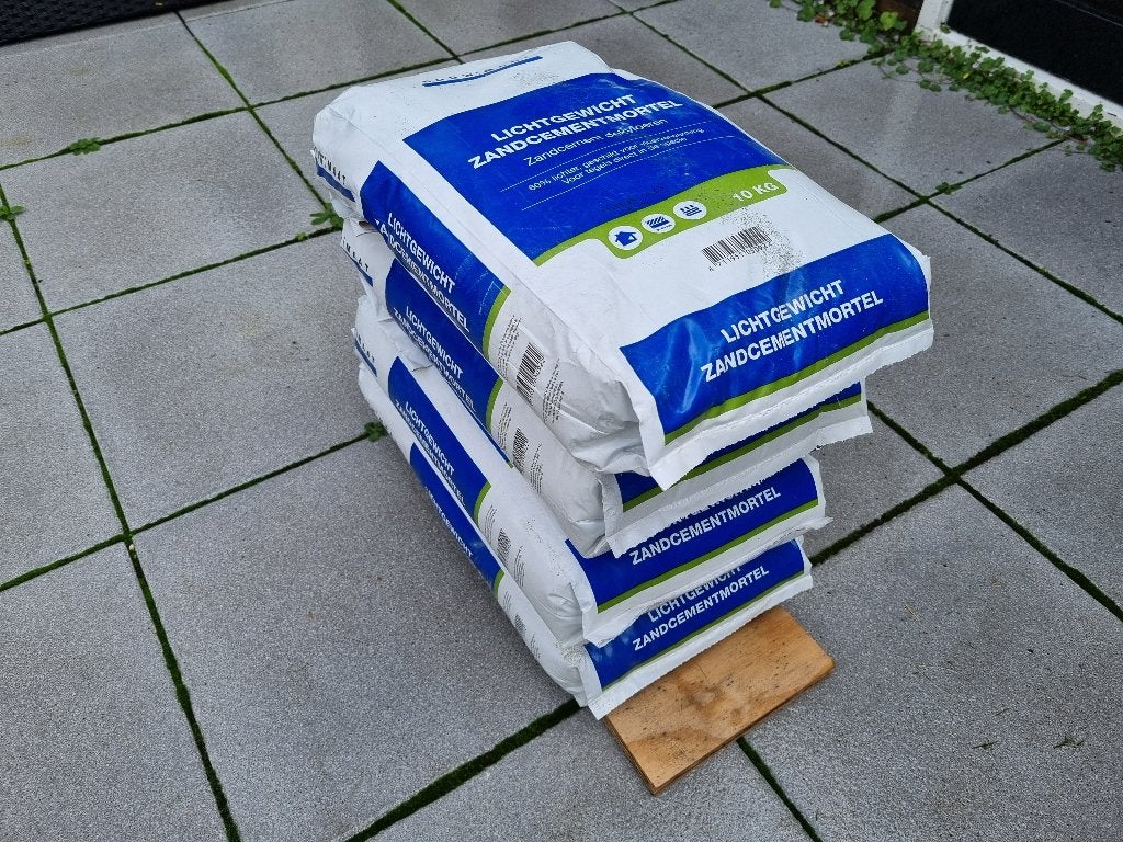 Zwaluwstaartplaten + 4 zakken zandcementmortel, Doe-het-zelf en Verbouw, Ophalen, Nieuw, Overige materialen, 20 tot 50 mm