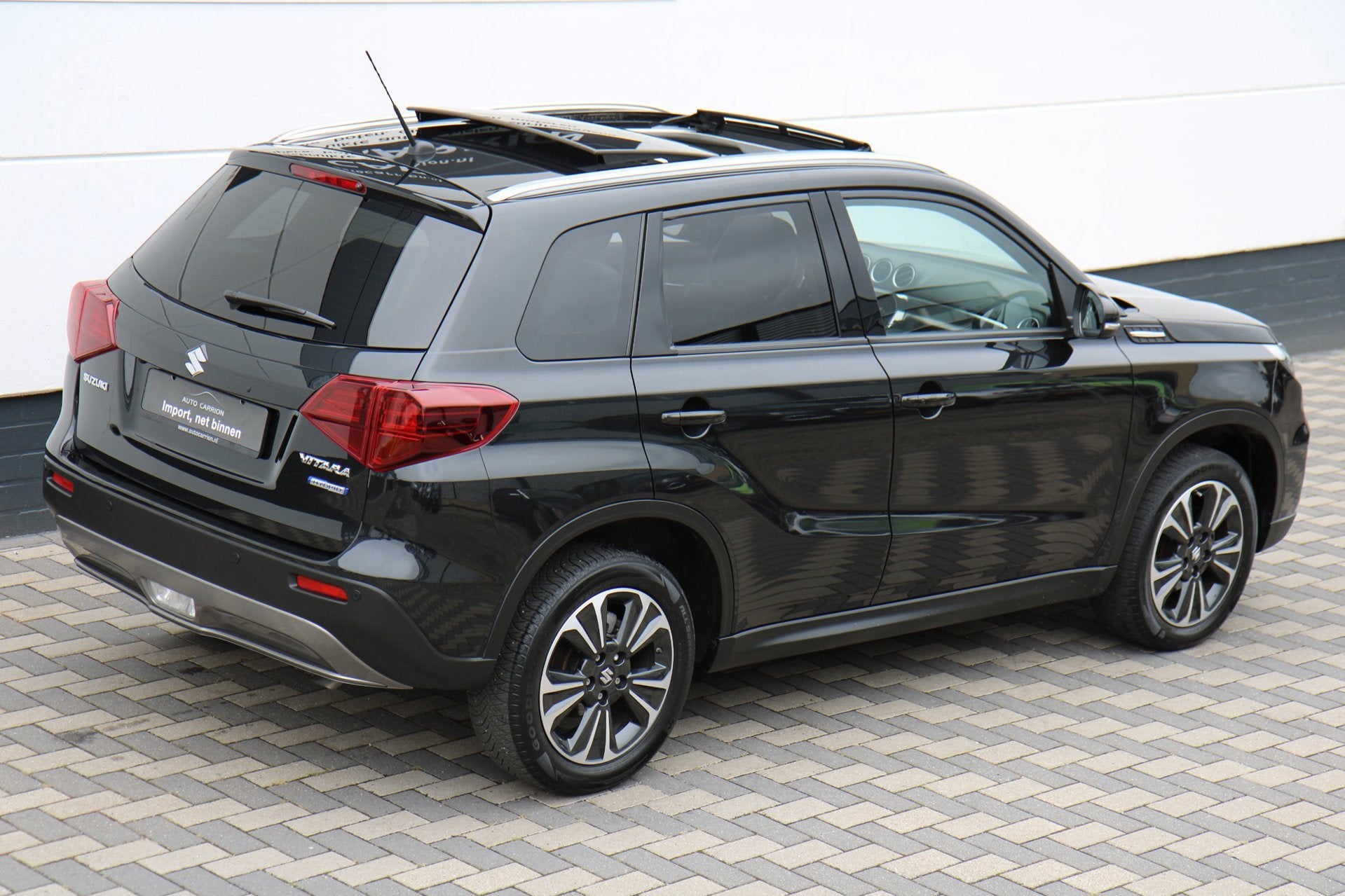 Suzuki Vitara 1.4 Boosterjet Style Smart Hybrid Pano Carplay, Voorwielaandrijving, Gebruikt, Zwart, 4 cilinders