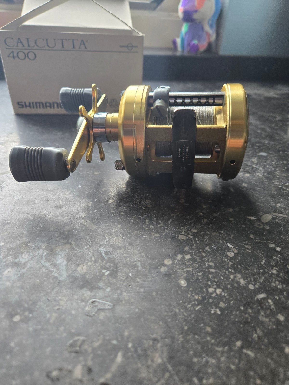Shimano Calcutta 400 uit 2001 - Perfect werkende baitcaster, Ophalen of Verzenden, Gebruikt, Molen