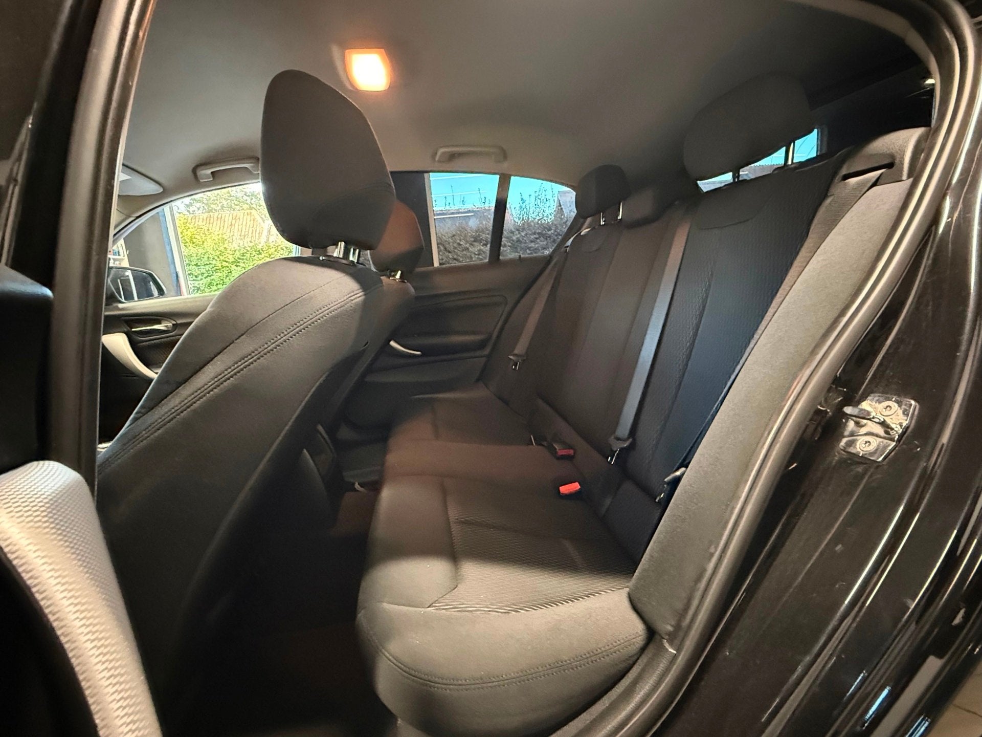 Foto 12 van BMW 1-serie 116D Business 2012 Zwart AIRCO|NAVI|XENON|NAP!