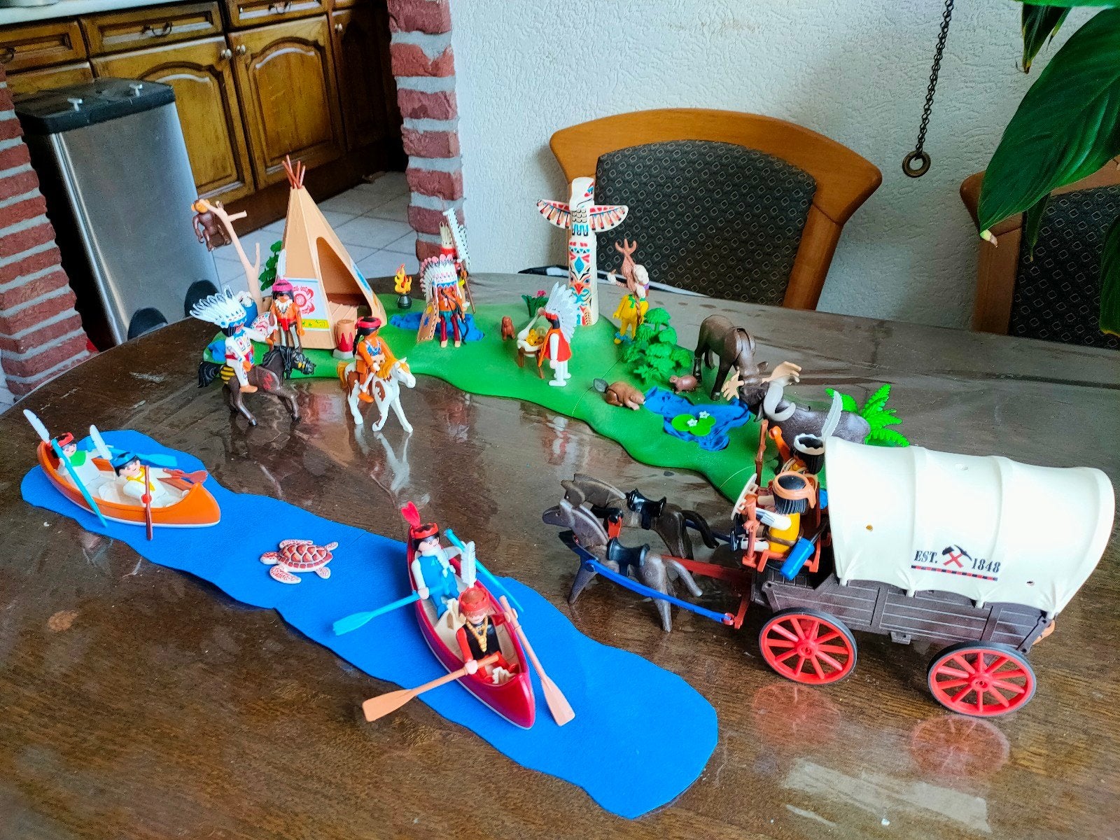 indianen dorp met huifkar, Ophalen of Verzenden
