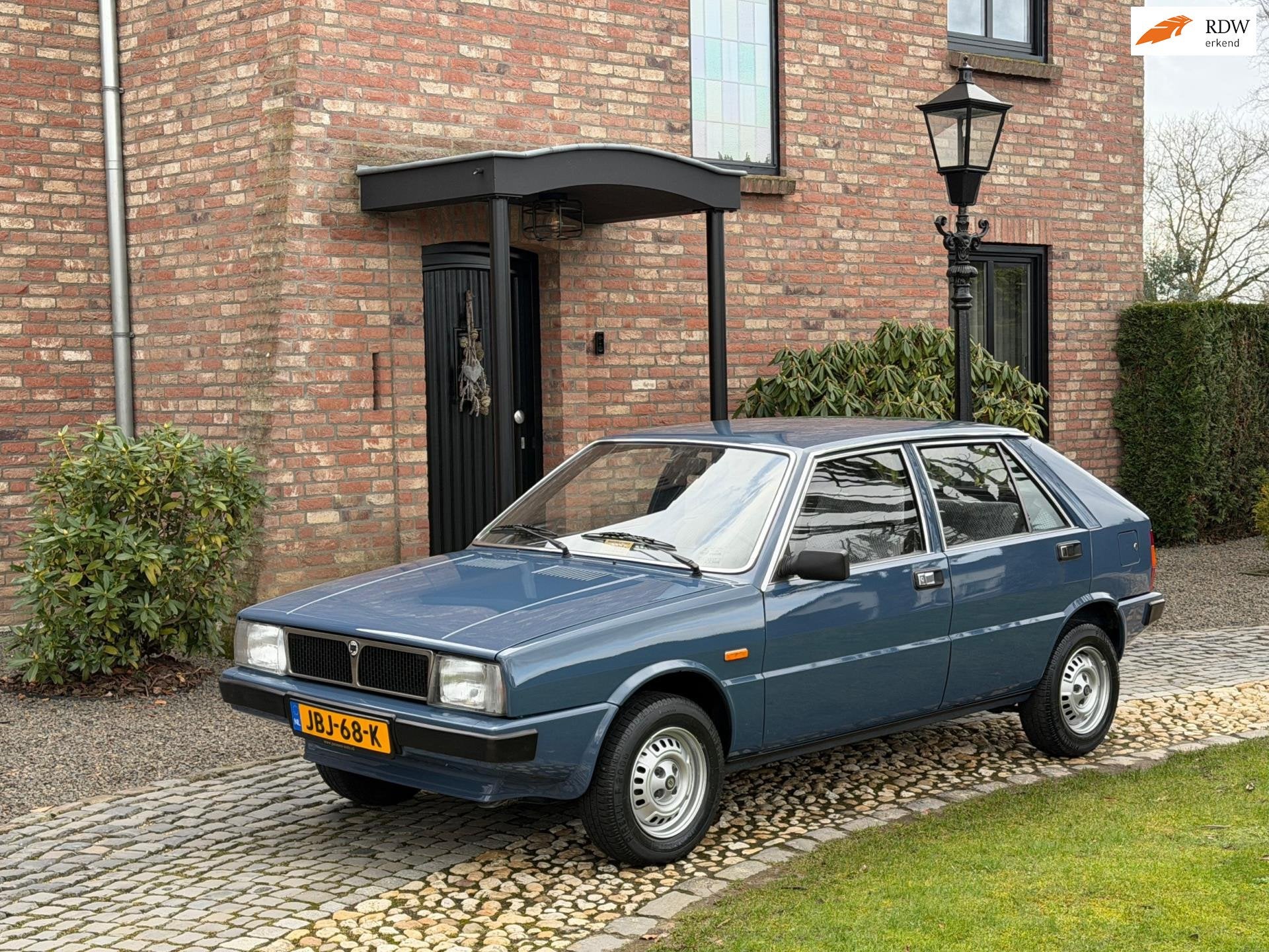 Lancia Delta 1.3 5-speed zeer mooi! Bouwjaar 1980, Auto's, Voorwielaandrijving, Blauw, Bedrijf, Grijs