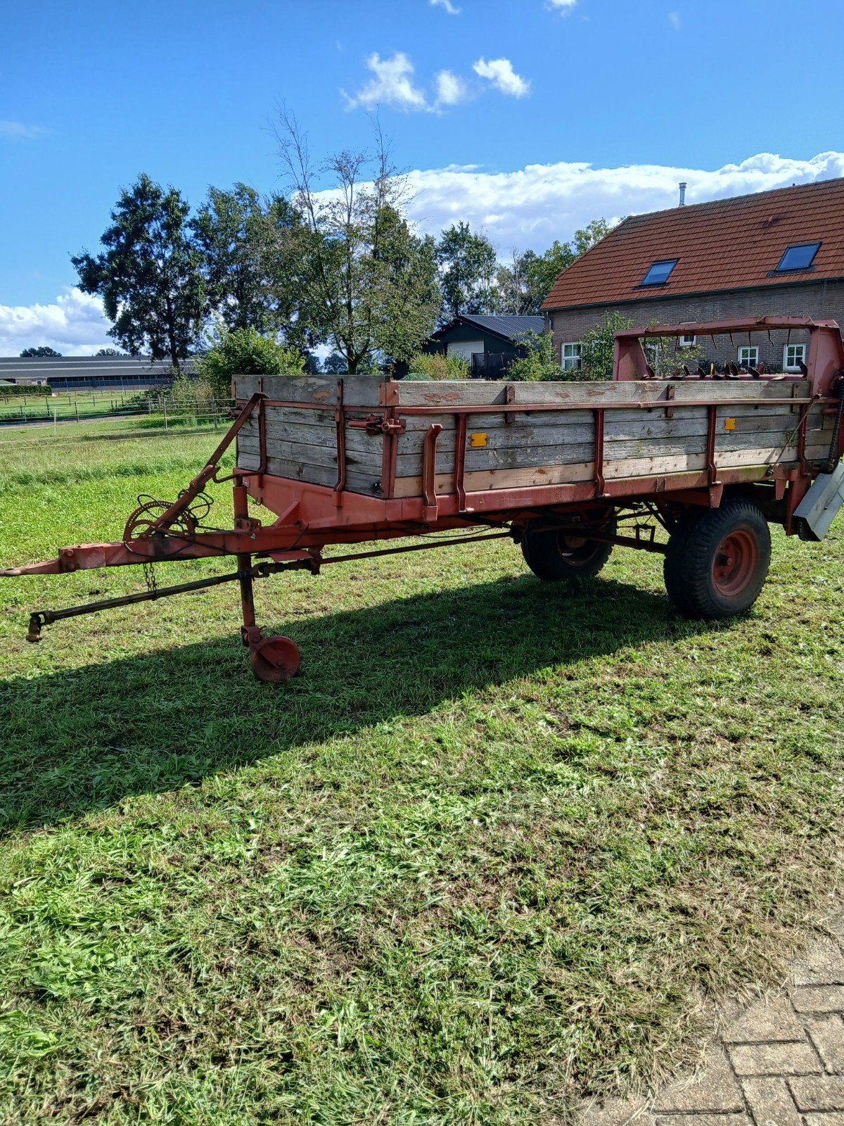 Krone mestverspreider, Ophalen, Containerberging
