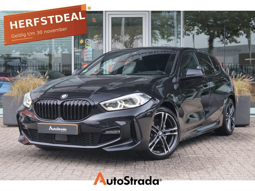 BMW 1-Serie (F40) 118i 140pk Aut M-Sport | Stoelverwarming |, Auto's, Dealer onderhouden, 136 pk, Gebruikt, Leder en Stof
