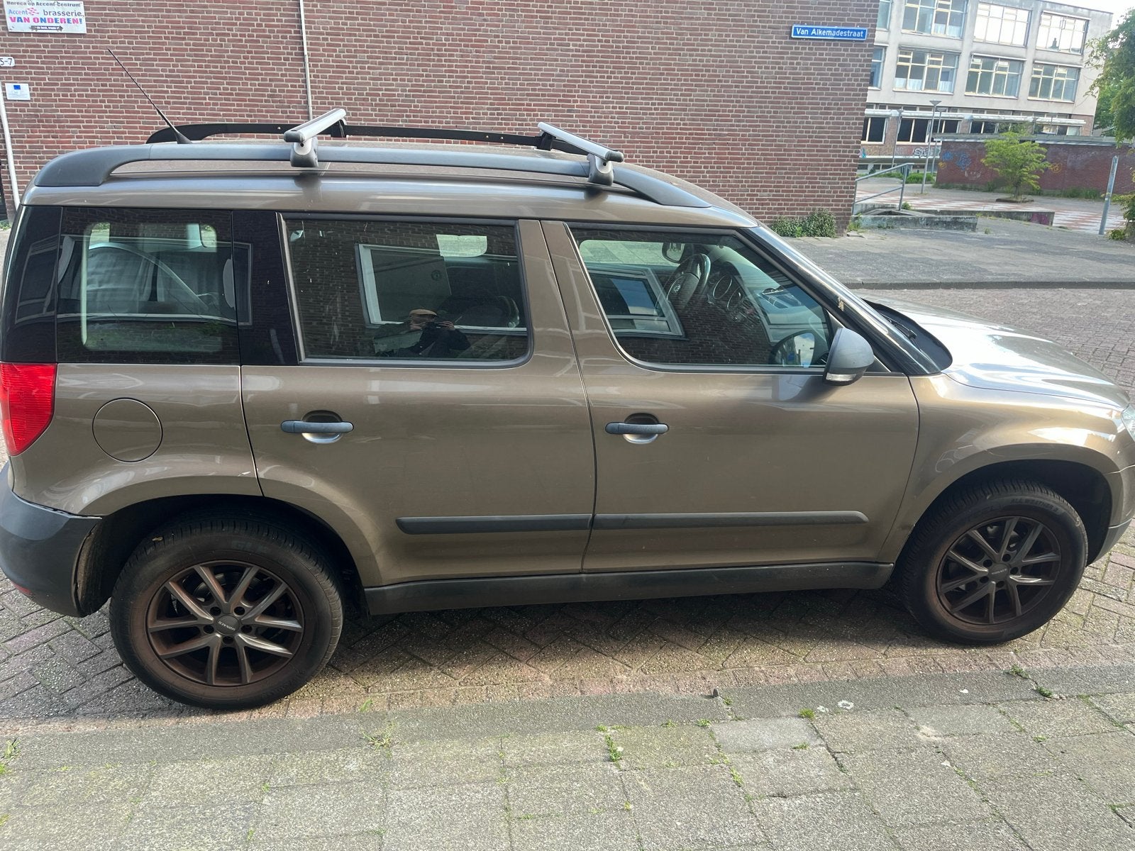 Auto Skoda Yeti 1.2 TSI 77KW 2011 Bruin, Auto's, Skoda, Voorwielaandrijving, 4 cilinders, Bruin, Origineel Nederlands